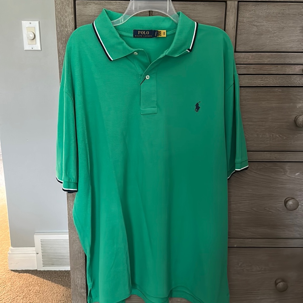 Men’s green polo shirt by Ralph Lauren. Size 2 XL. New with tags.